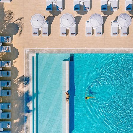 Ivi Mare - Designed For Adults By Louis Hotels Geroskipou Ngoại thất bức ảnh Aerial view of the pool at the Hotel du Cap-Eden-Roc, Cap d'Antibes, France